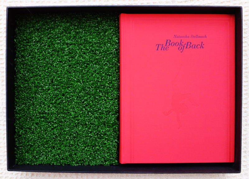 Natascha Stellmach The Book of Back, offset printing on paper, thread, photograph, DVD, linen, faux grass, box, gloves, tote bag, limited ed. 123